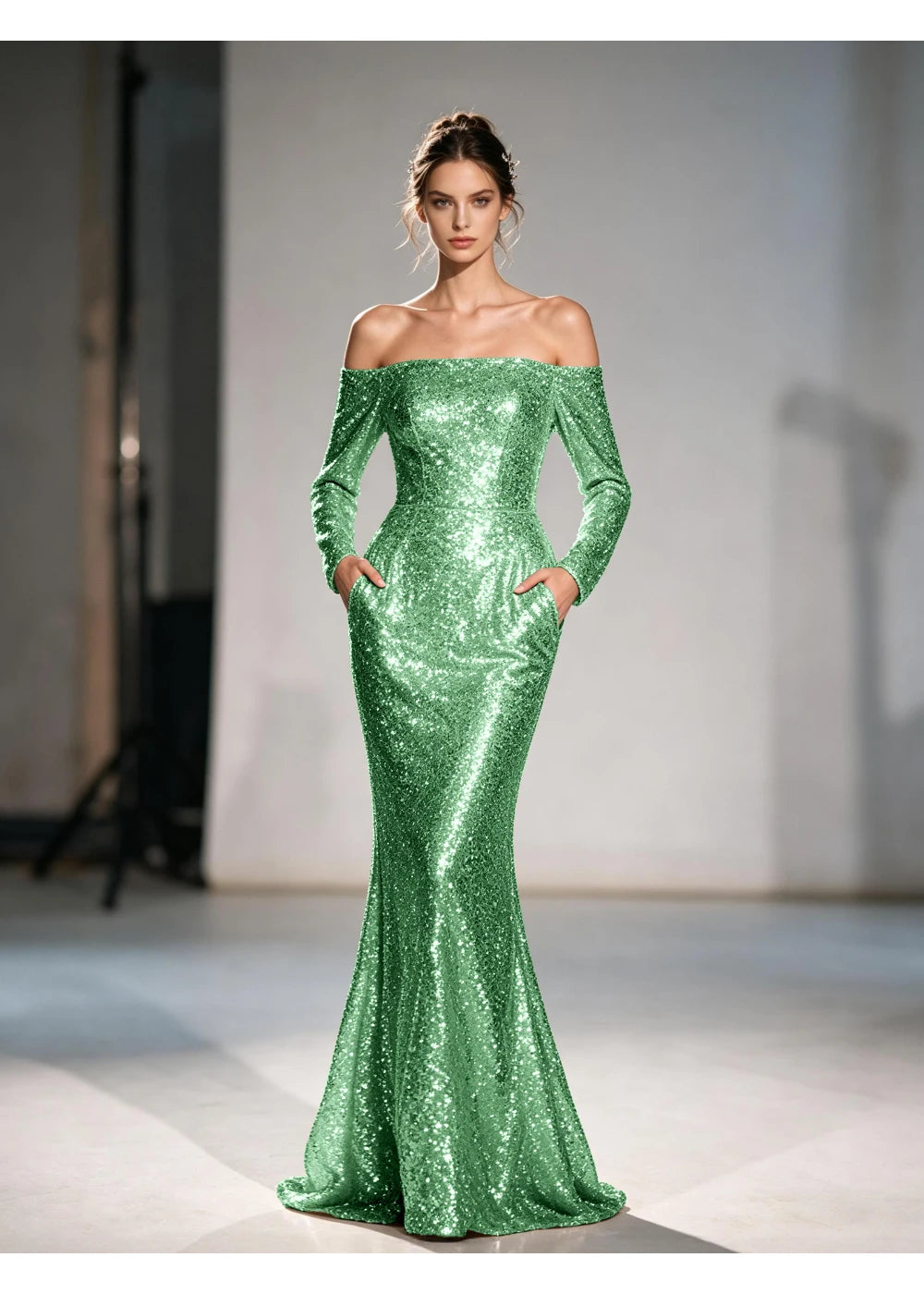 Front view of the mint green sequin mermaid gown with the same formal silhouette