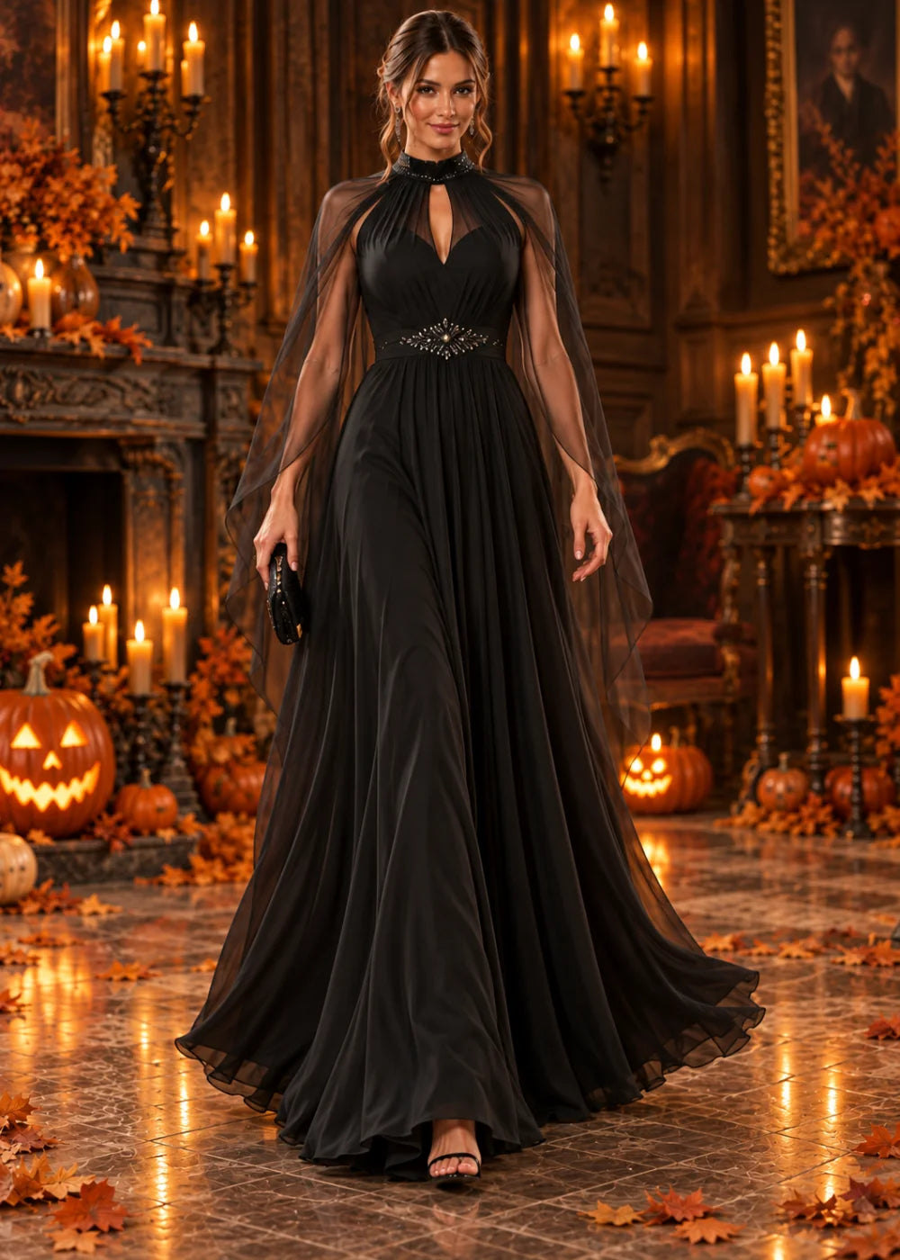 Front view of the black gown with its skirt in motion; the high collar, long keyhole, sheer cape layer and gathered black skirt.
