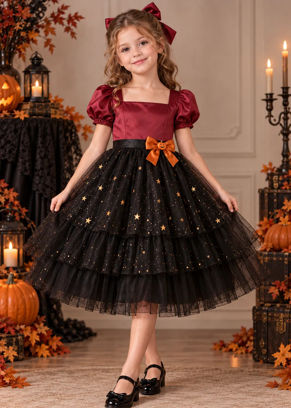 Front view of the burgundy and black flower girl dress.