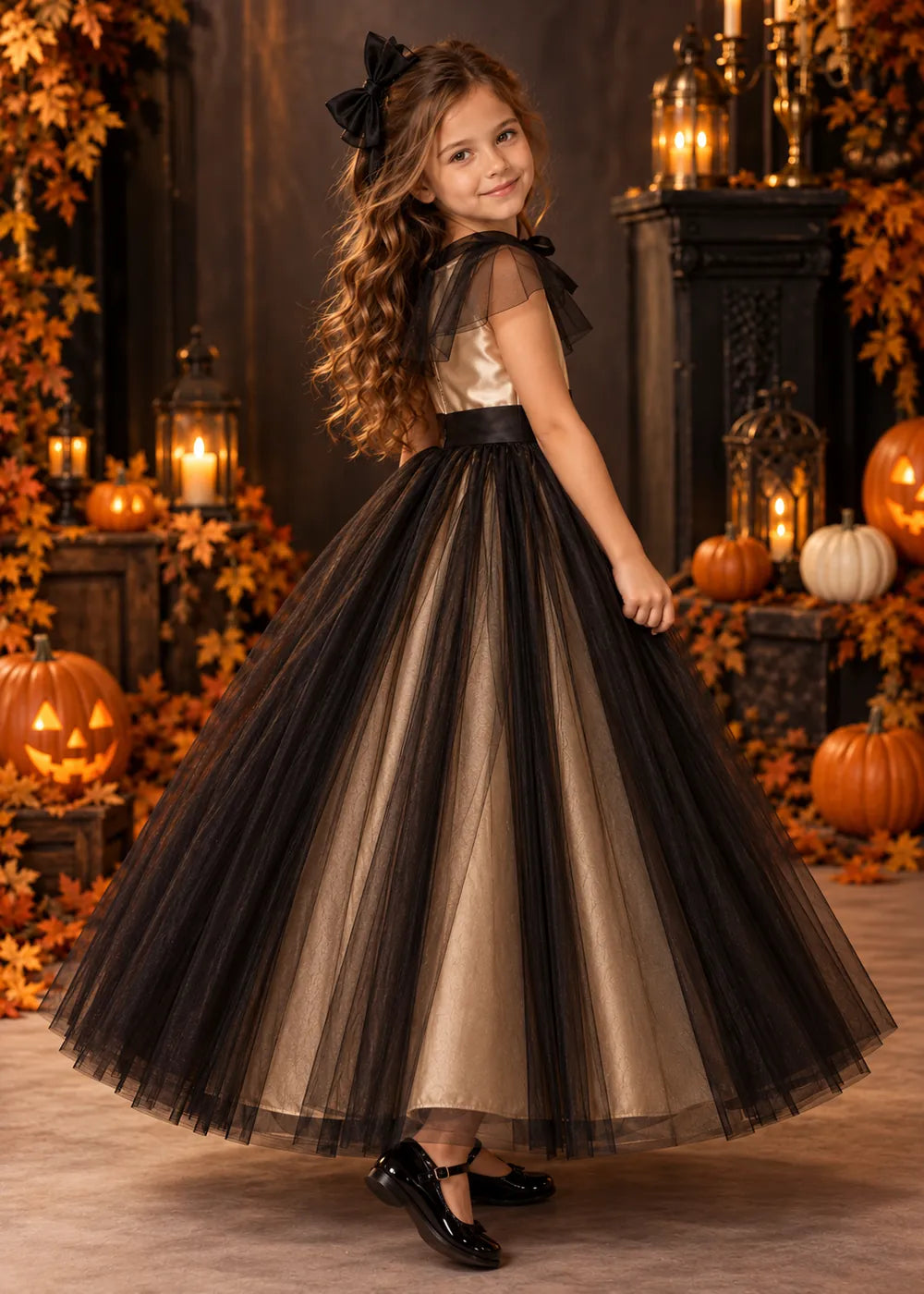 Side back view of the champagne and black flower girl dress.