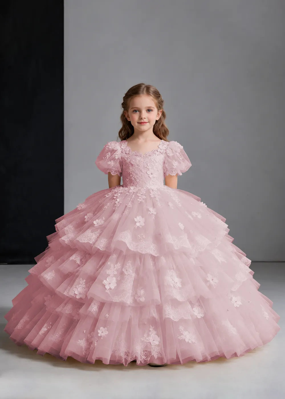 Flower girl dress in Dusty Rose, front view.