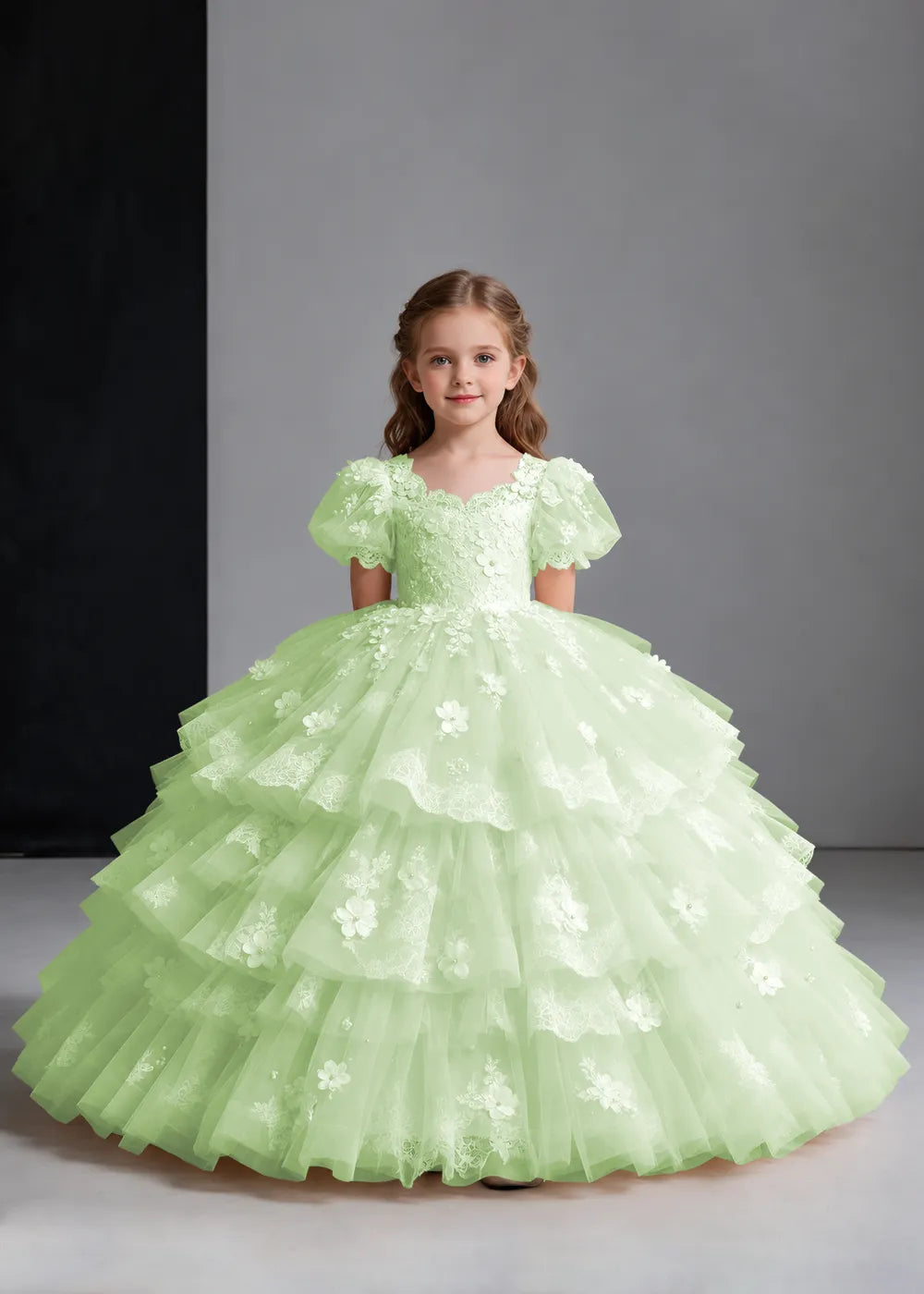 Flower girl dress in Light Green, front view.