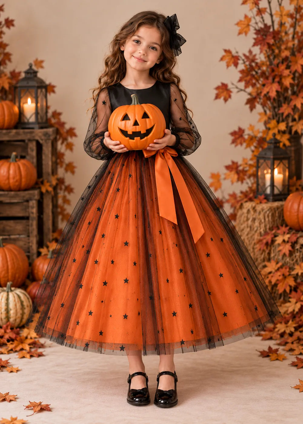 Detail view of the orange and black flower girl dress.