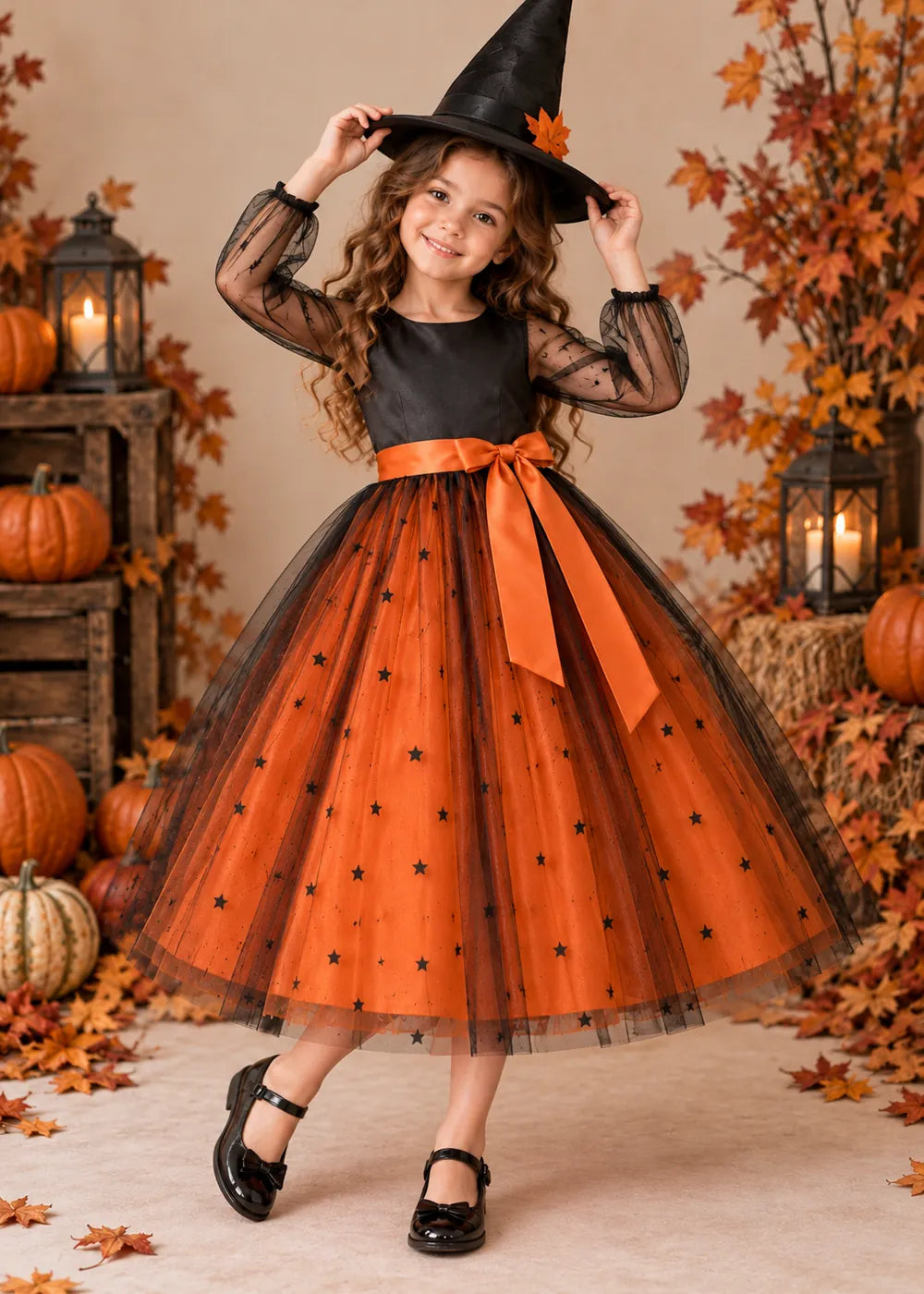 Detail view of the orange and black flower girl dress.
