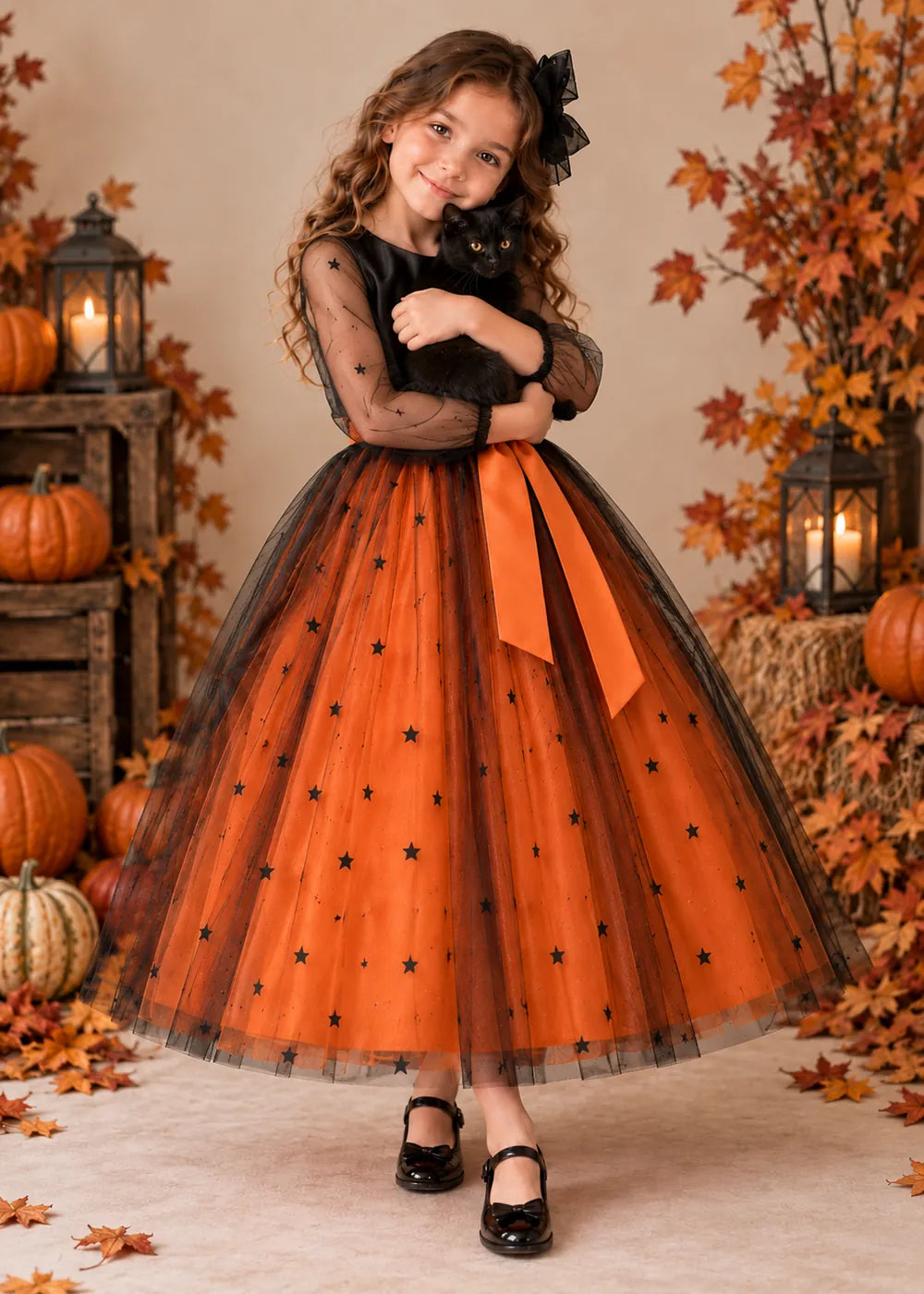 Detail view of the orange and black flower girl dress.