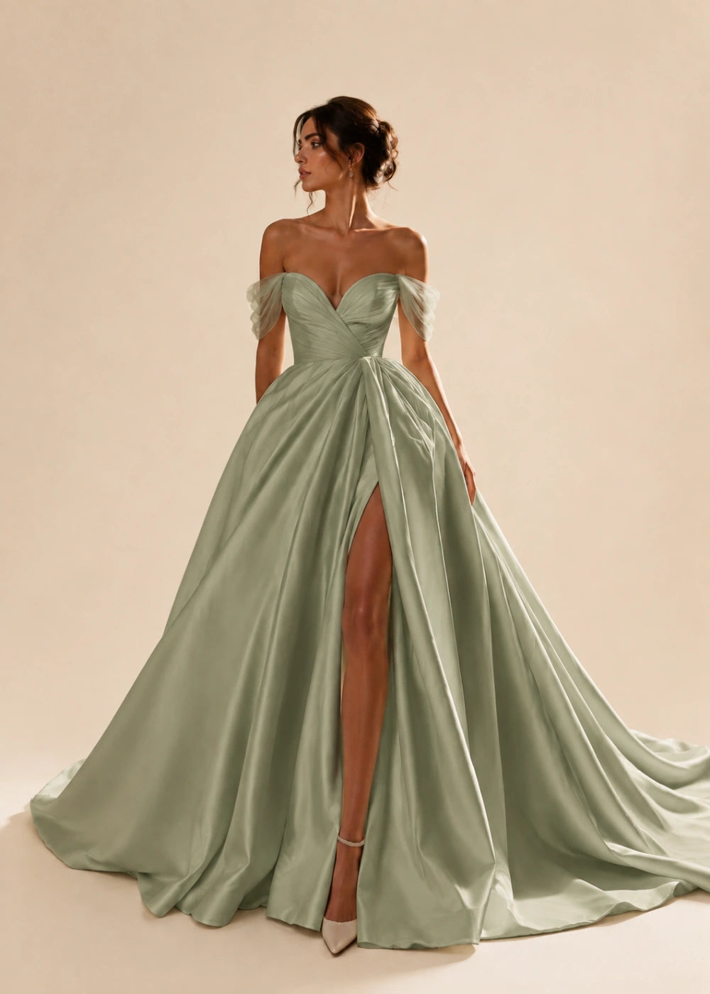 Front view of the sage green off-the-shoulder A-line gown with a corset bodice, high slit, and train