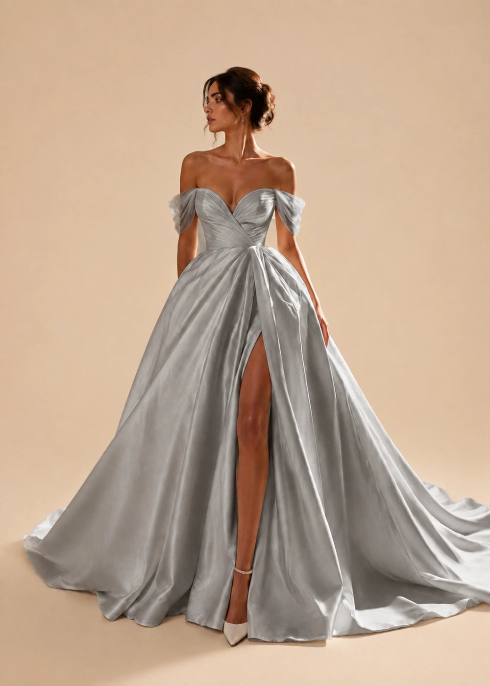 Front view of the silver gray off-the-shoulder A-line gown with a corset bodice, high slit, and train