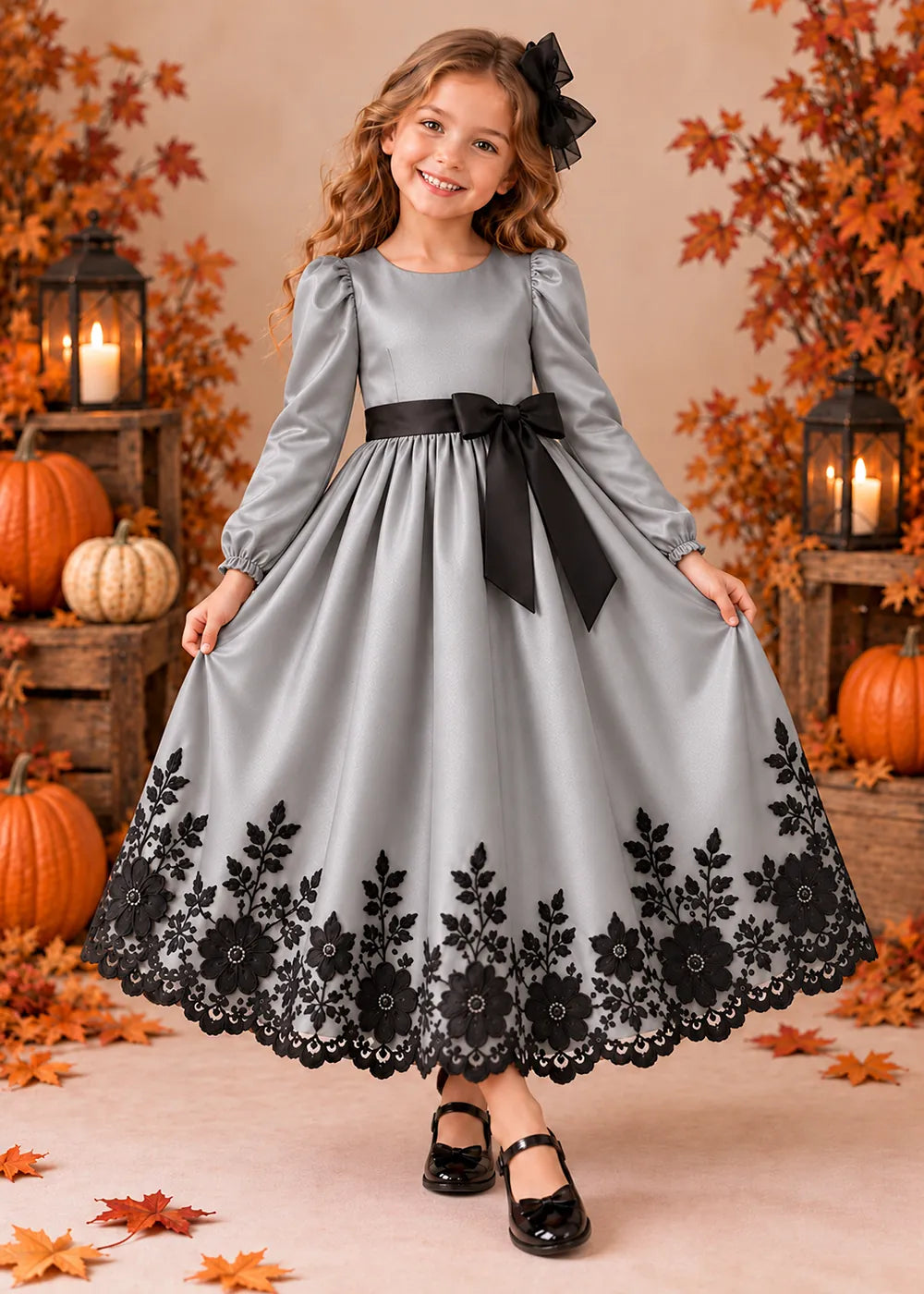 Front view of a silver gray long-Sleeve Flower Girl Dress with Black Floral Hem.