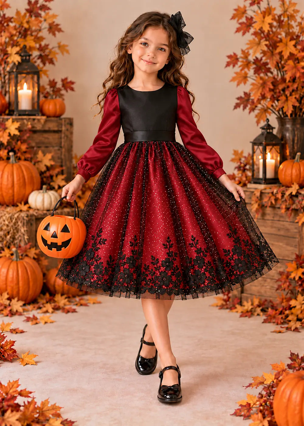Front view of a burgundy puff-Sleeve Flower Girl Dress with Floral Hem.