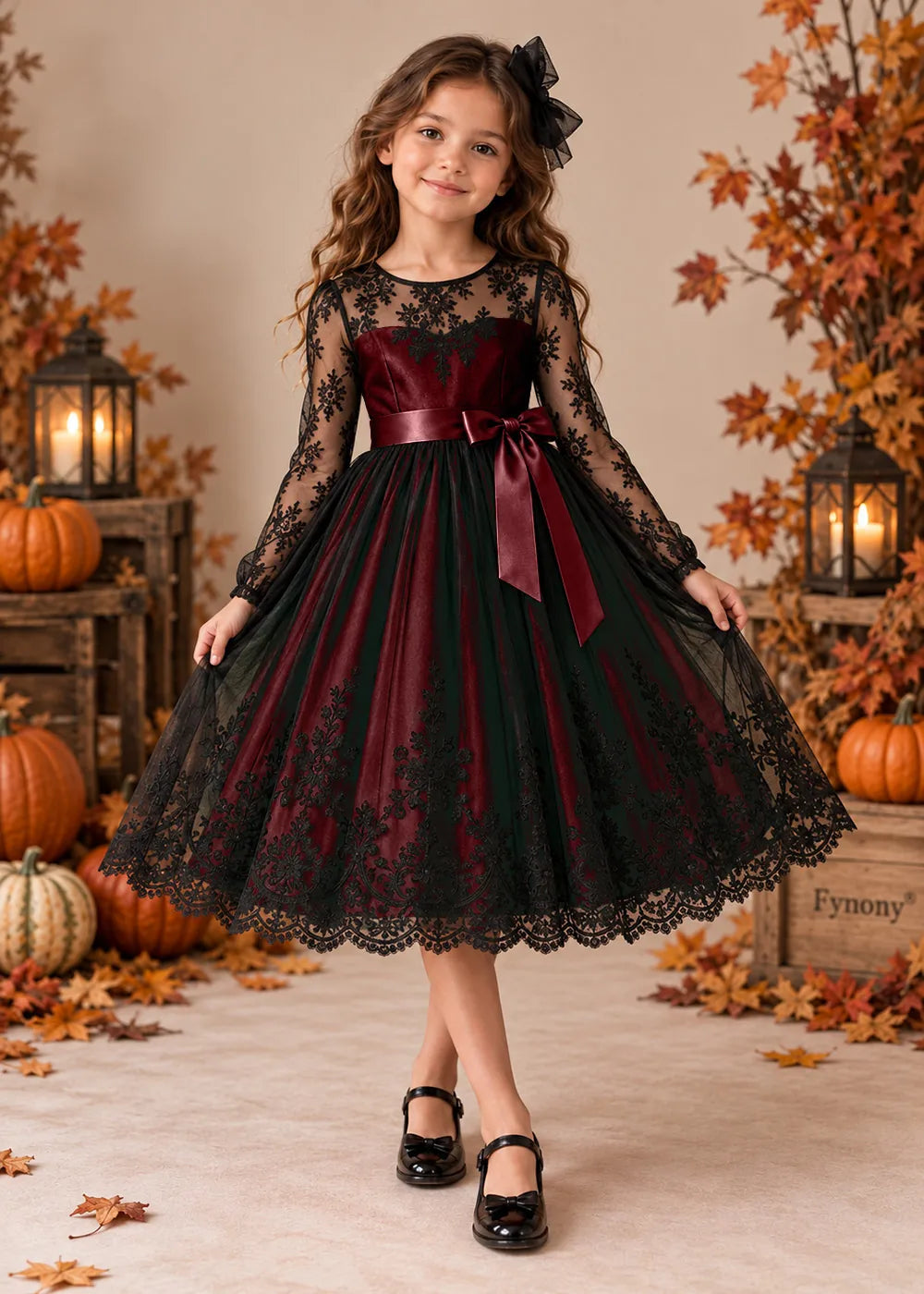 Front view of a burgundy flower Girl Dress with Black Lace and Long Sleeves.