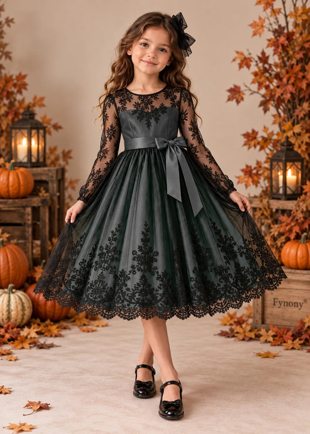 Front view of a gray flower Girl Dress with Black Lace and Long Sleeves.