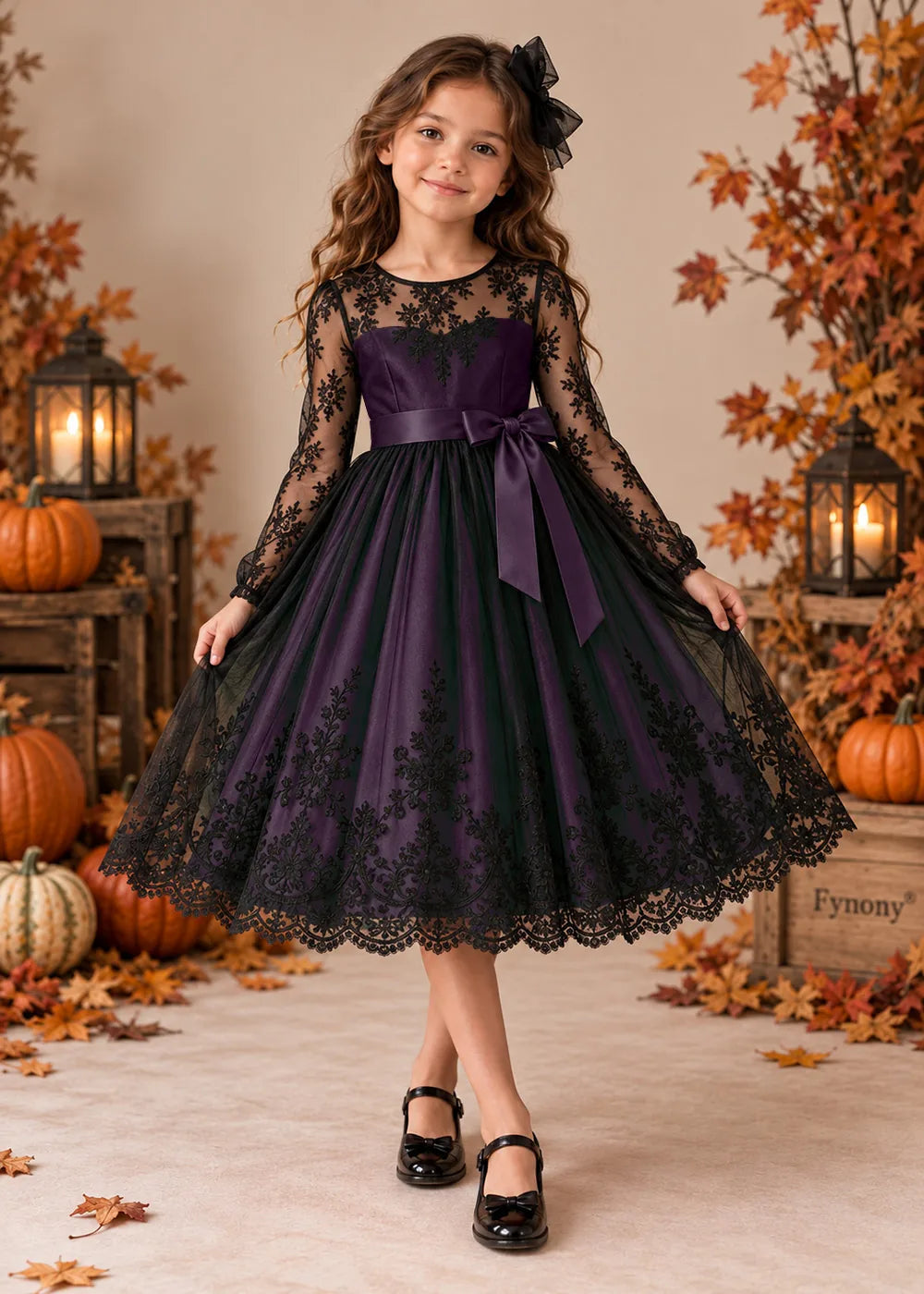 Front view of a purple flower Girl Dress with Black Lace and Long Sleeves.
