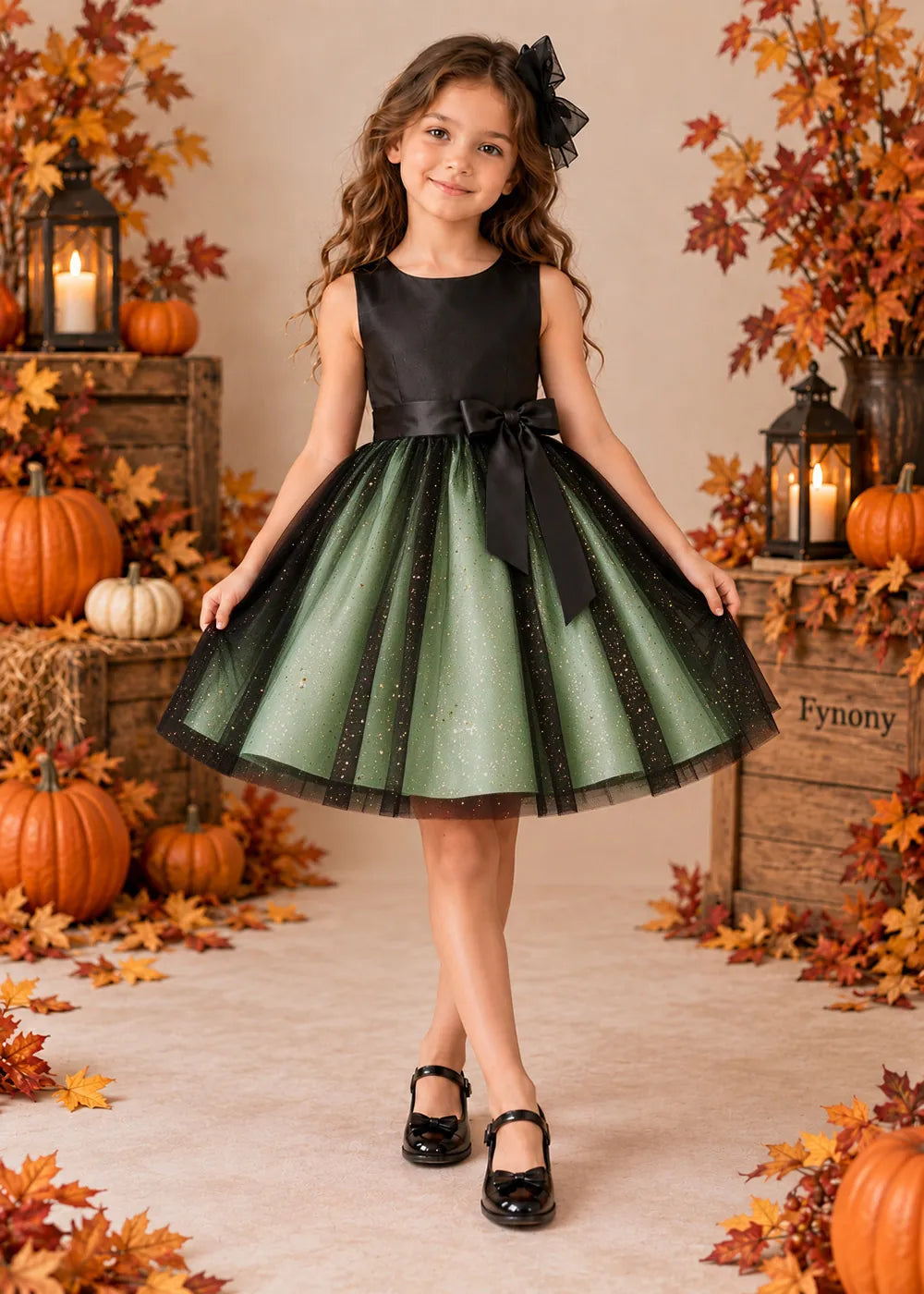 Front view of a light green sleeveless Flower Girl Dress with Front Bow.