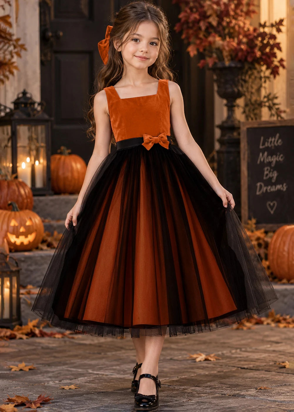 Front view of a orange sleeveless Flower Girl Dress.
