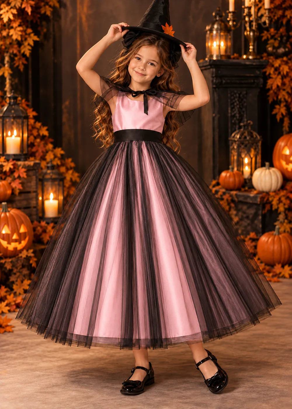 Front view of a blush pink and Black Flower Girl Dress with Sheer Neckline Tie.