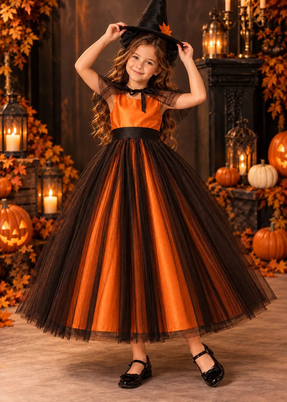 Front view of a pumpkin orange and Black Flower Girl Dress with Sheer Neckline Tie.
