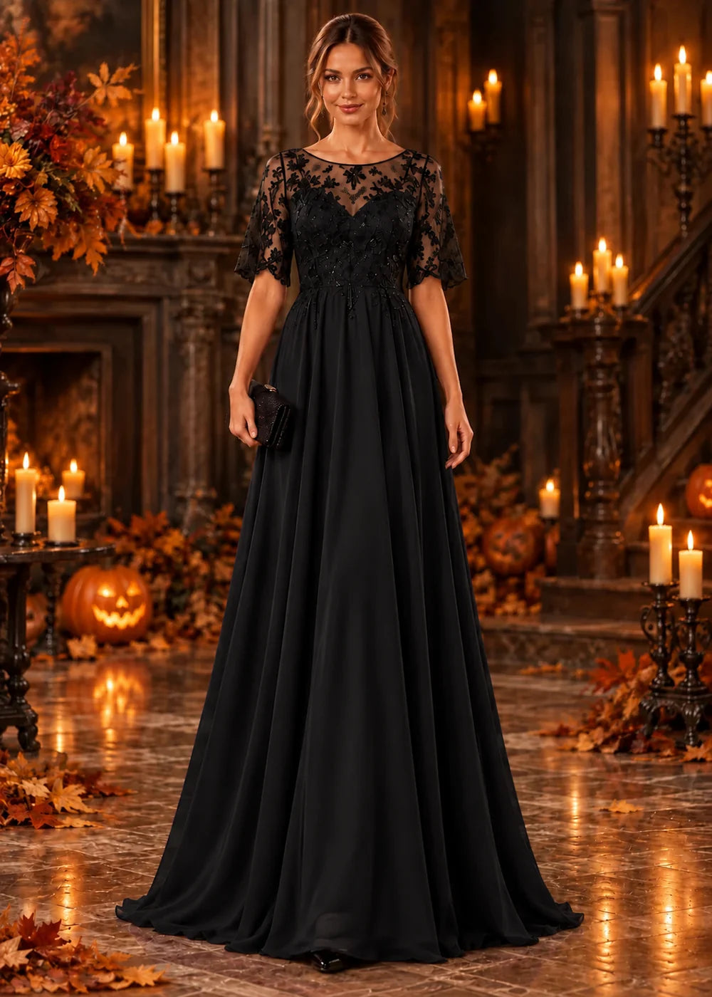 Front view of the black evening gown with an illusion flutter-sleeve bodice and a tonal lace chiffon skirt.
