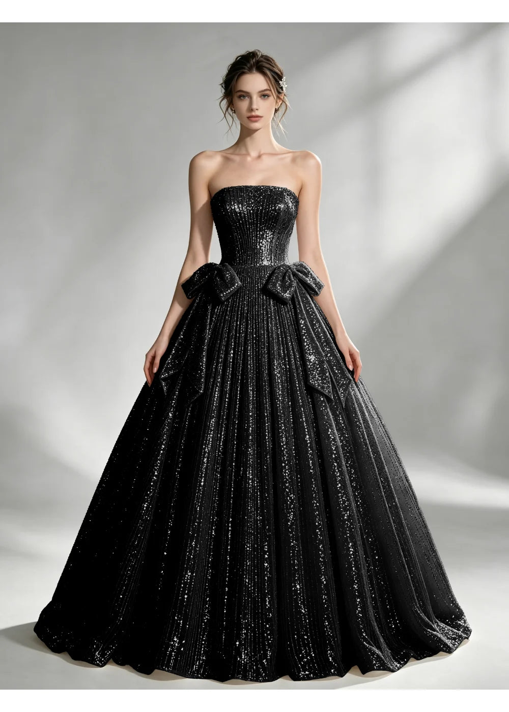 Front view of the black sequin twin bow gown with the same bridal silhouette