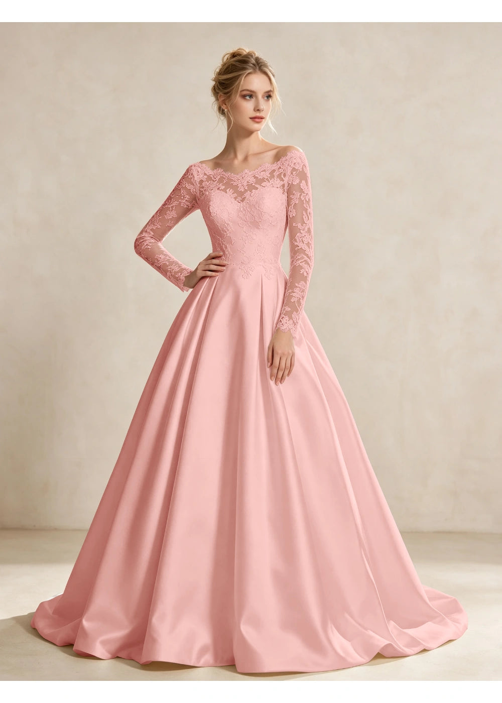 Front view of the blush pink illusion lace satin gown with the same bridal silhouette
