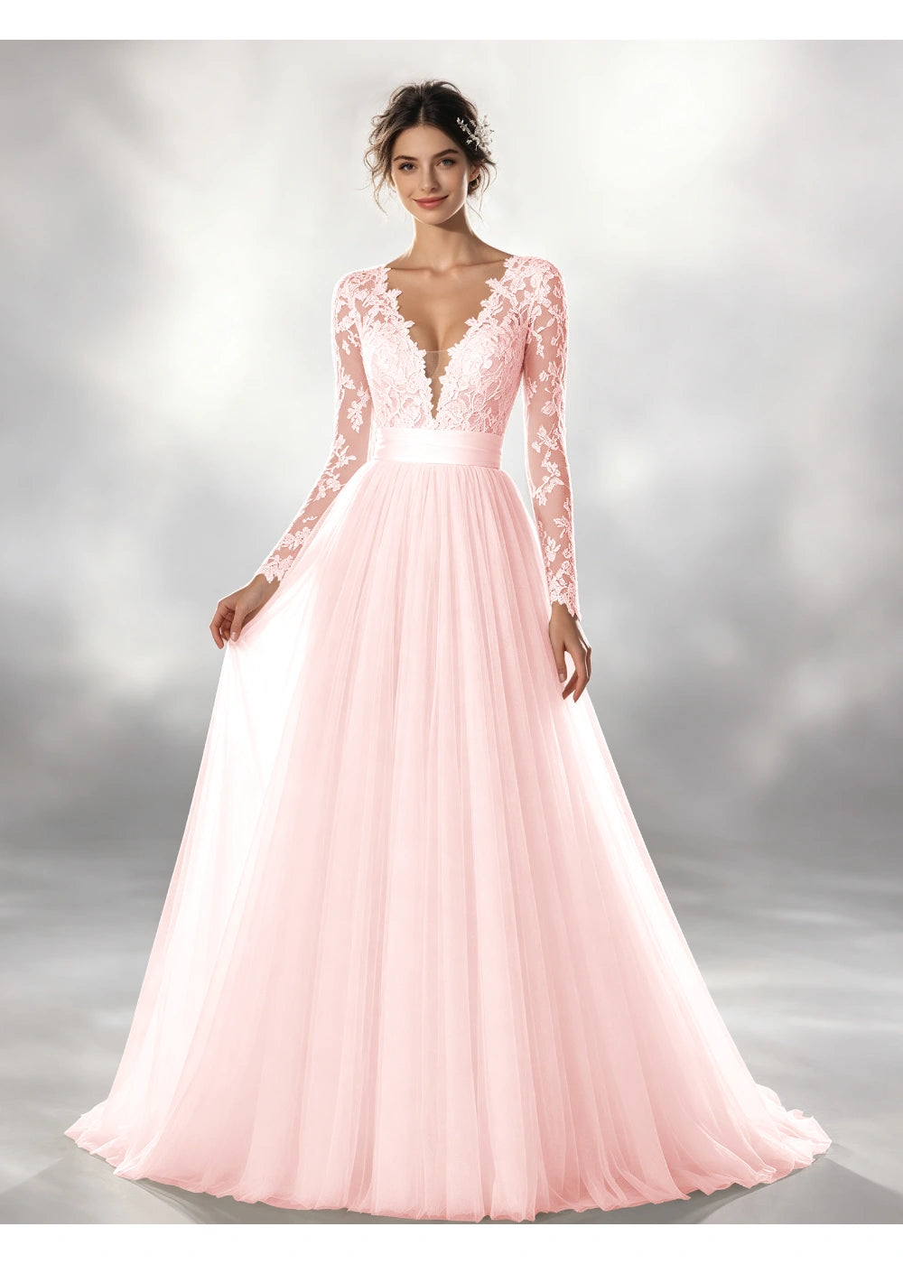 Front view of the blush pink lace waistband tulle gown with the same bridal silhouette