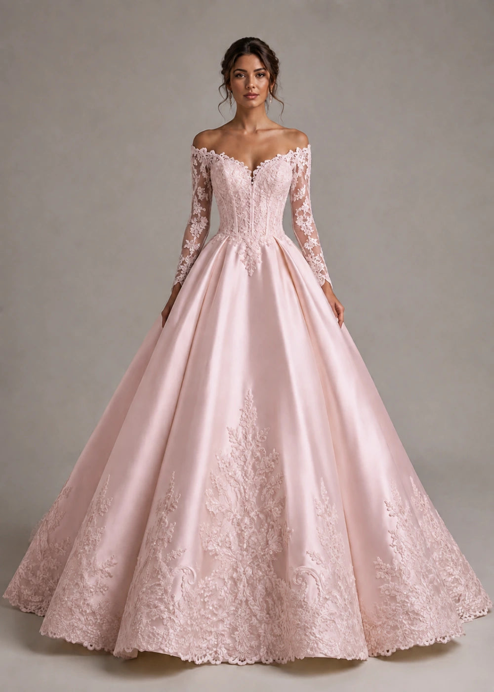 Front view of the blush pink off-the-shoulder ball gown with long floral-lace sleeves and a full skirt