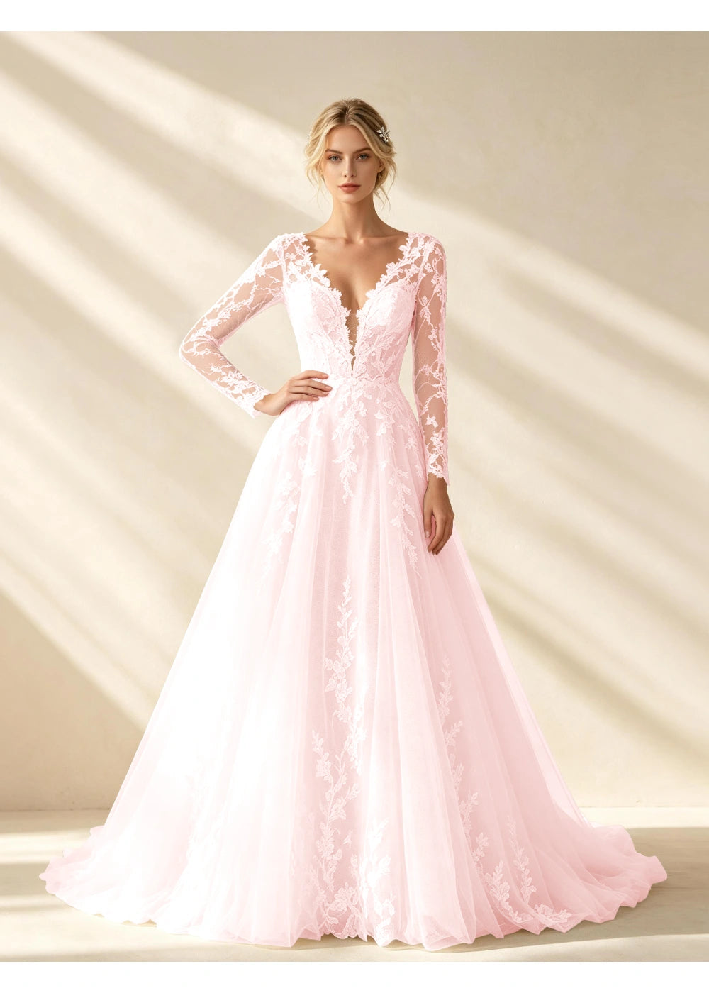 Front view of the blush pink v neck lace a line gown with the same bridal silhouette