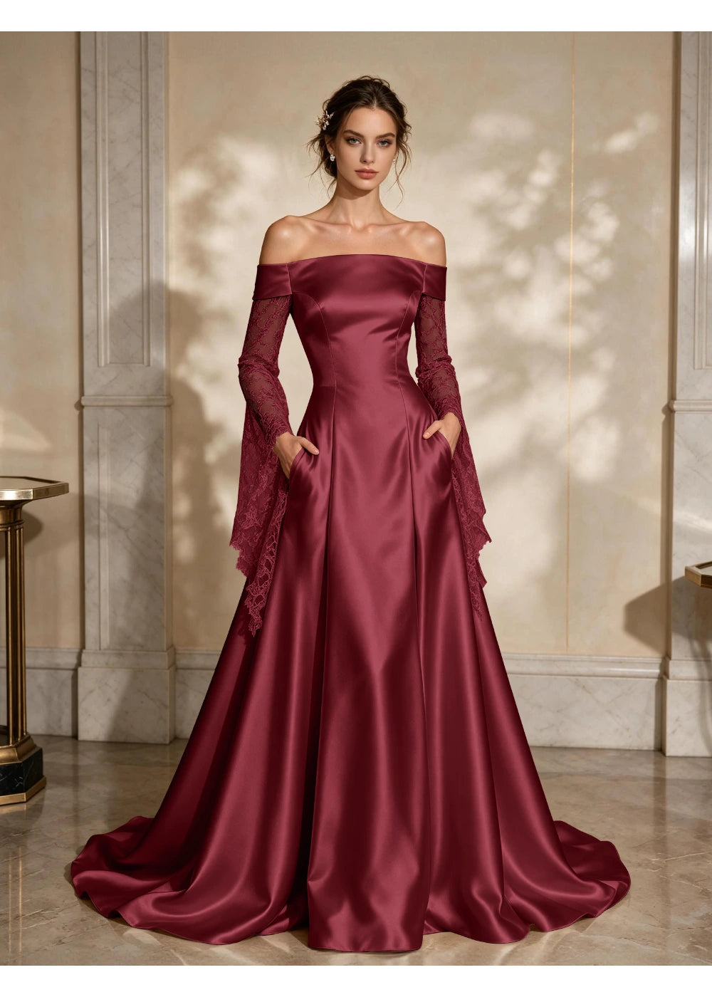 Front view of a burgundy satin A-line gown with a folded off-shoulder neckline and draped lace sleeve extensions