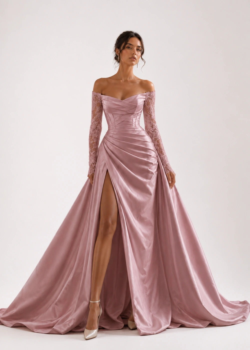 Front view of the dusty rose off-the-shoulder A-line gown with long lace sleeves and a thigh-high slit