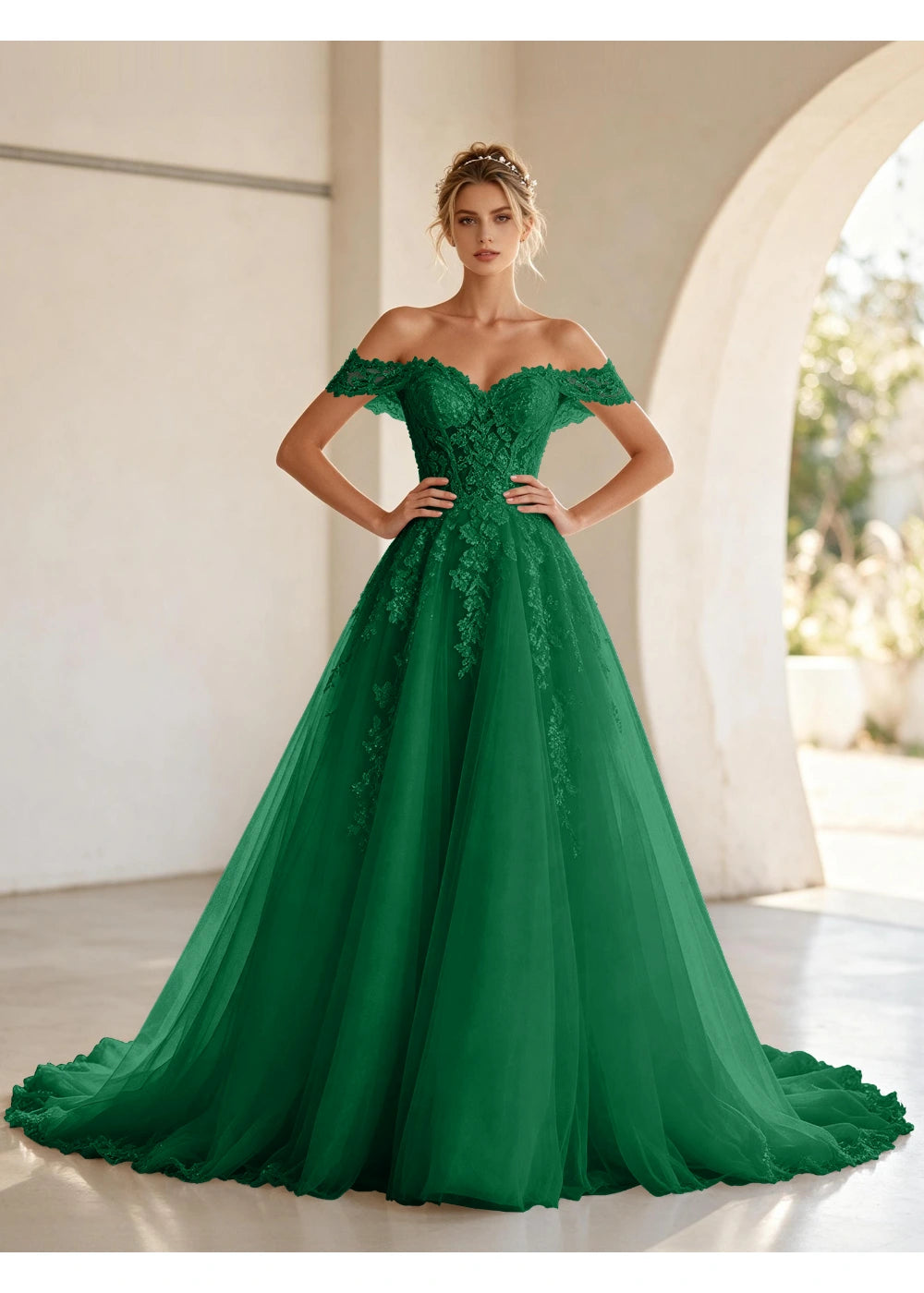 Front view of the emerald green off shoulder lace tulle gown with the same bridal silhouette