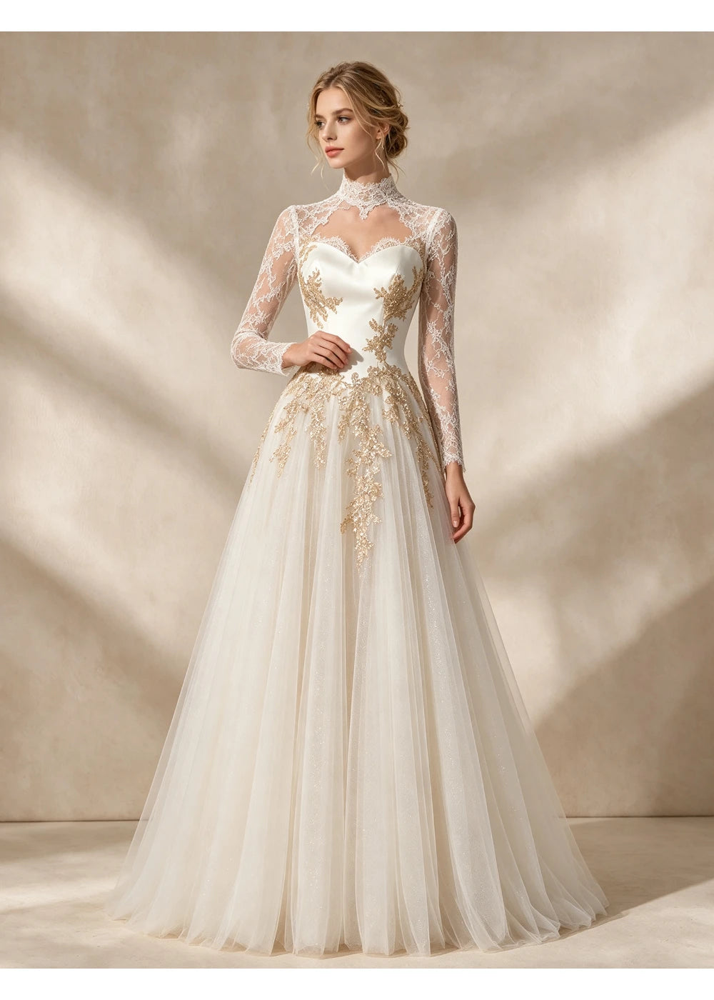 Three-quarter front view of the ivory and gold A-line gown with long sheer lace sleeves