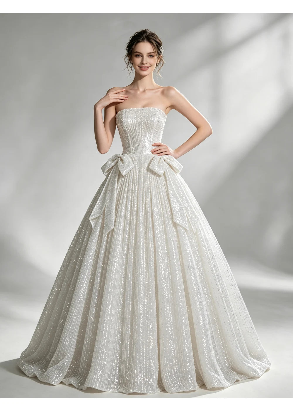 Full-length front view of the ivory strapless bodice and sequin-covered A-line skirt