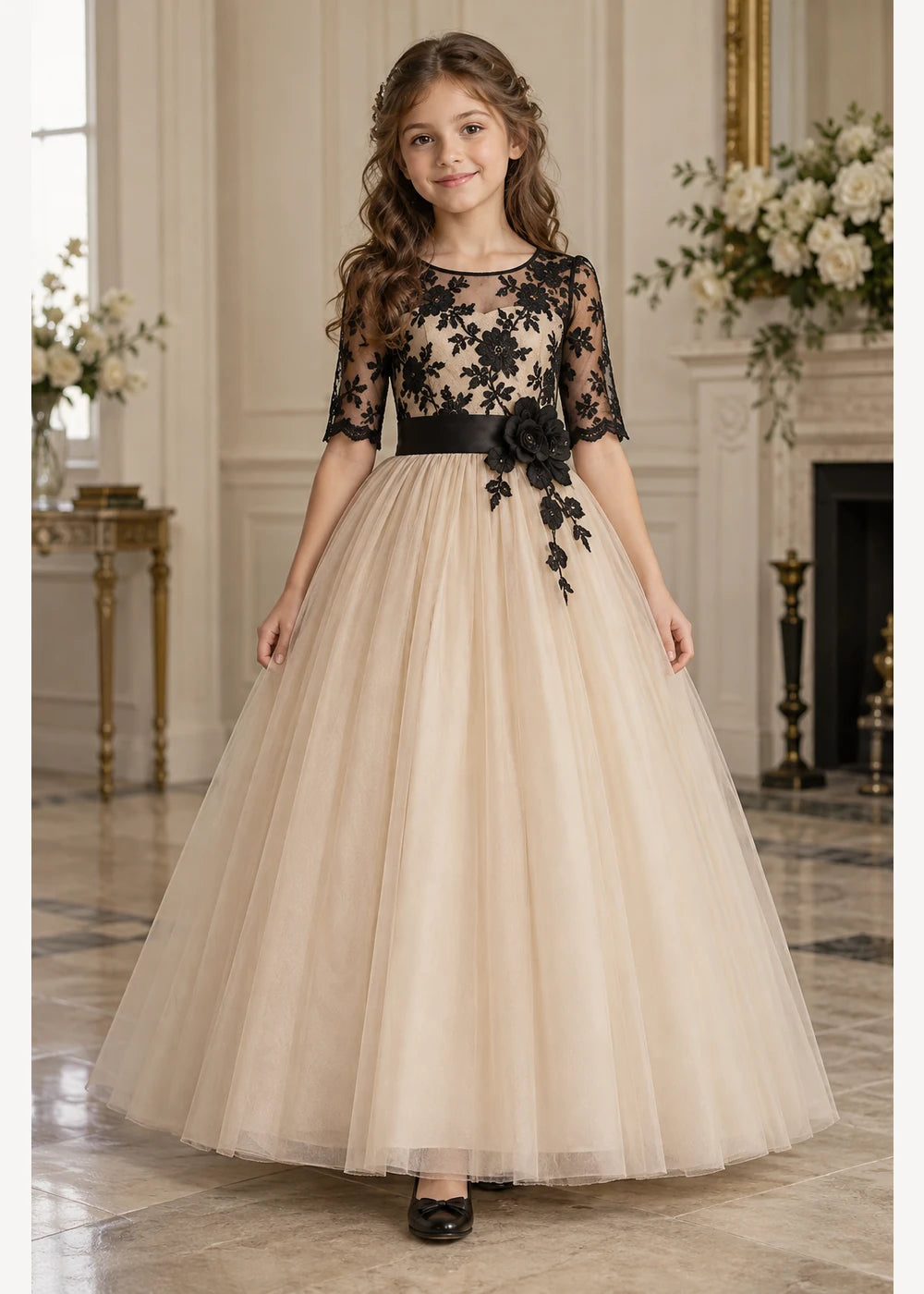 Front view of the beige and black flower girl dress.
