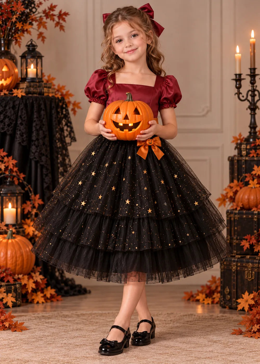 Detail view of the burgundy and black flower girl dress.