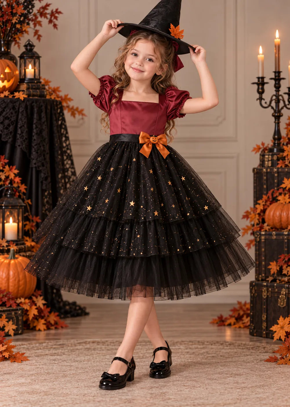 Detail view of the burgundy and black flower girl dress.