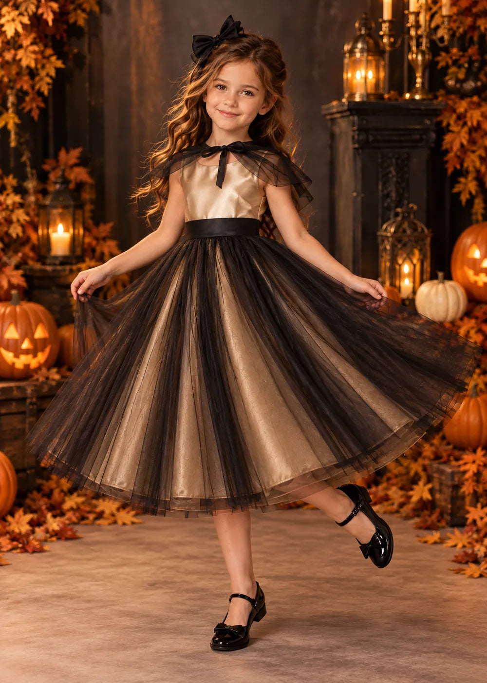Detail view of the champagne and black flower girl dress.