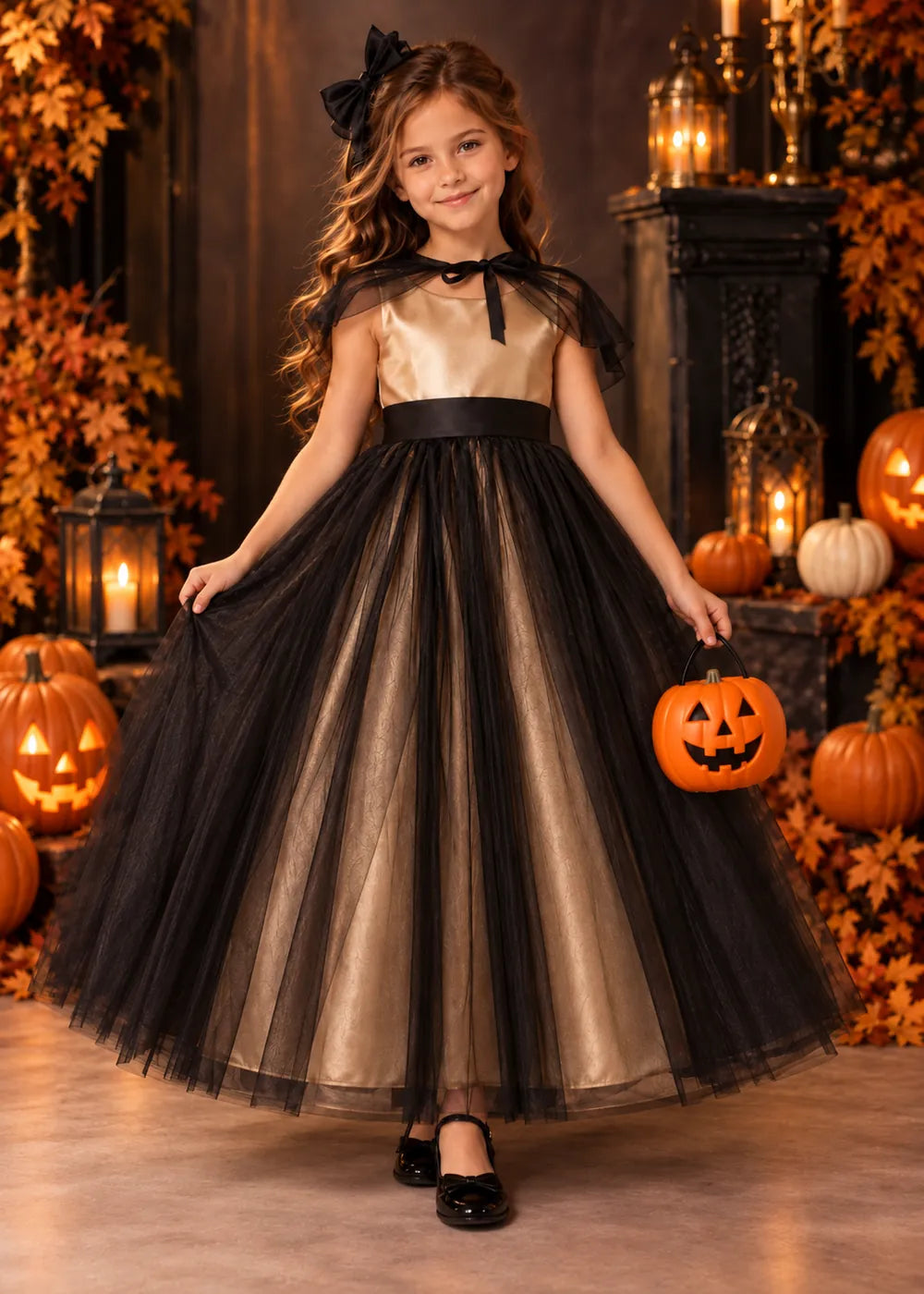 Detail view of the champagne and black flower girl dress.