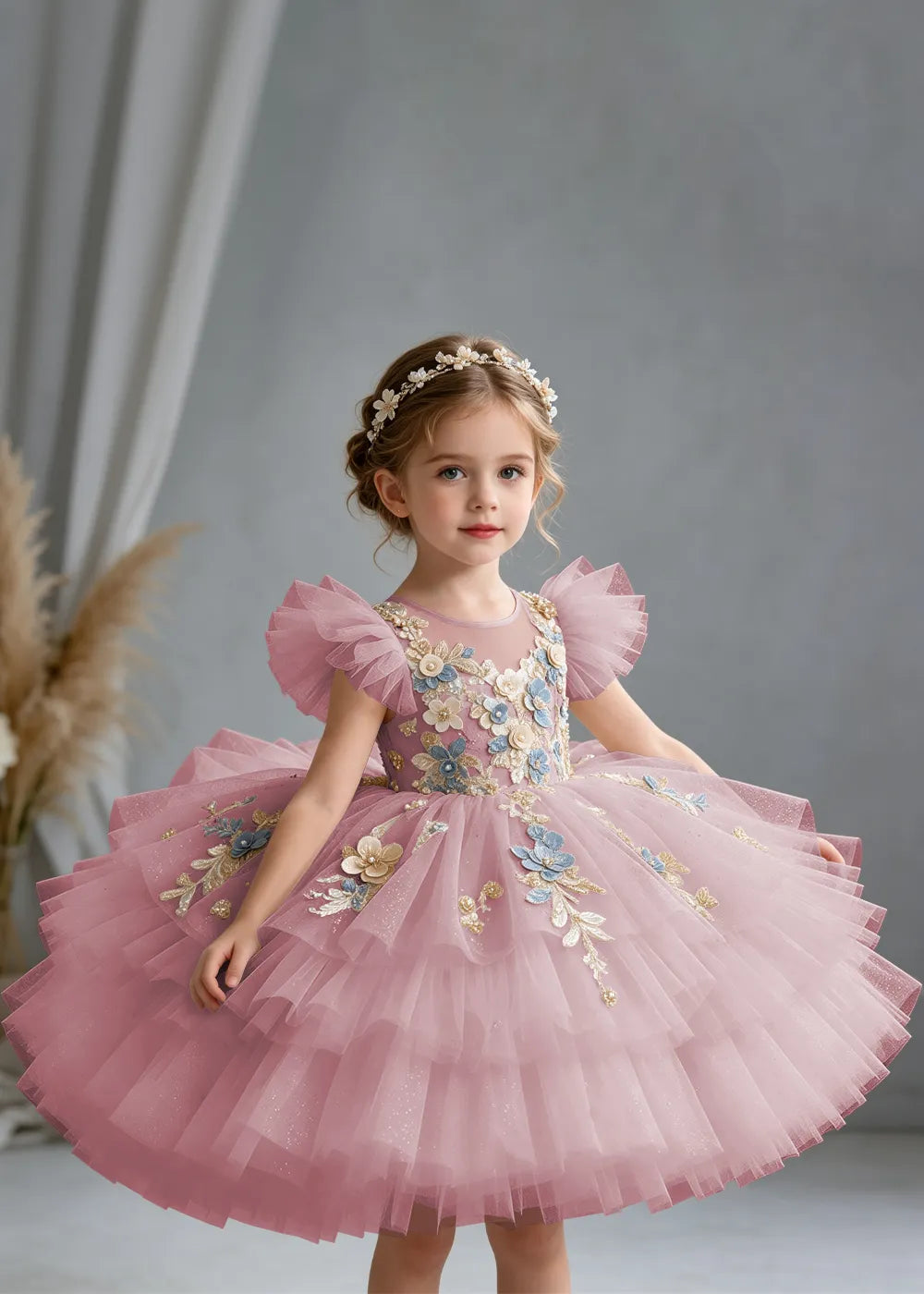 Flower girl dress in Dusty Rose, front view.