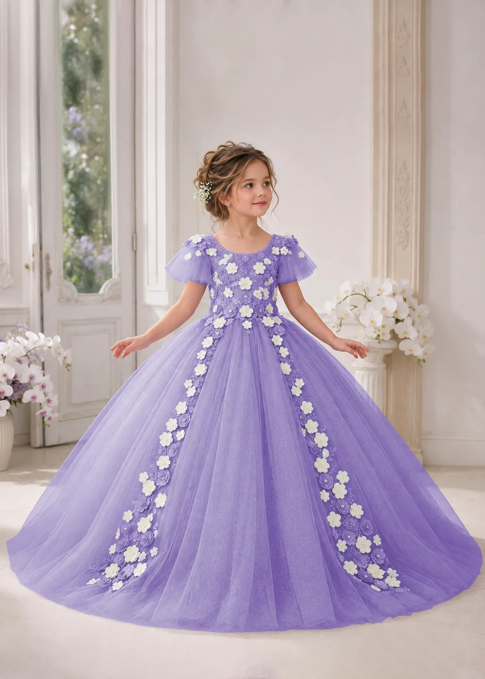 Front view of a child wearing a lavender flower girl dress with a round neckline, sheer flutter cap sleeves and a floral vine cascading down both sides of a full tulle skirt.