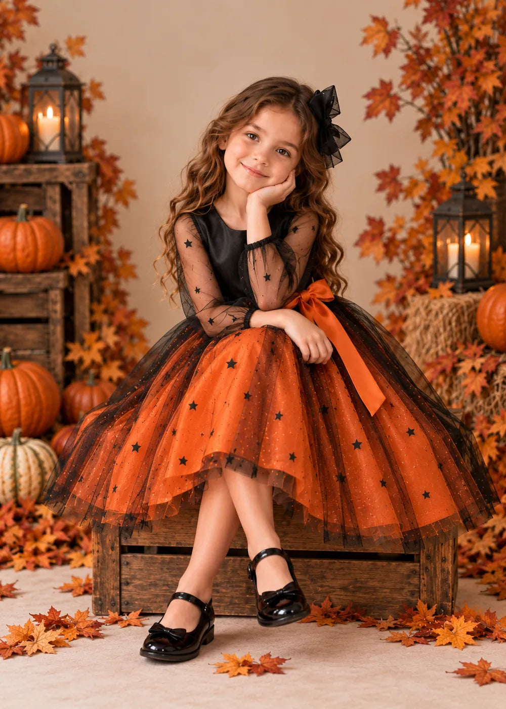 Detail view of the orange and black flower girl dress.