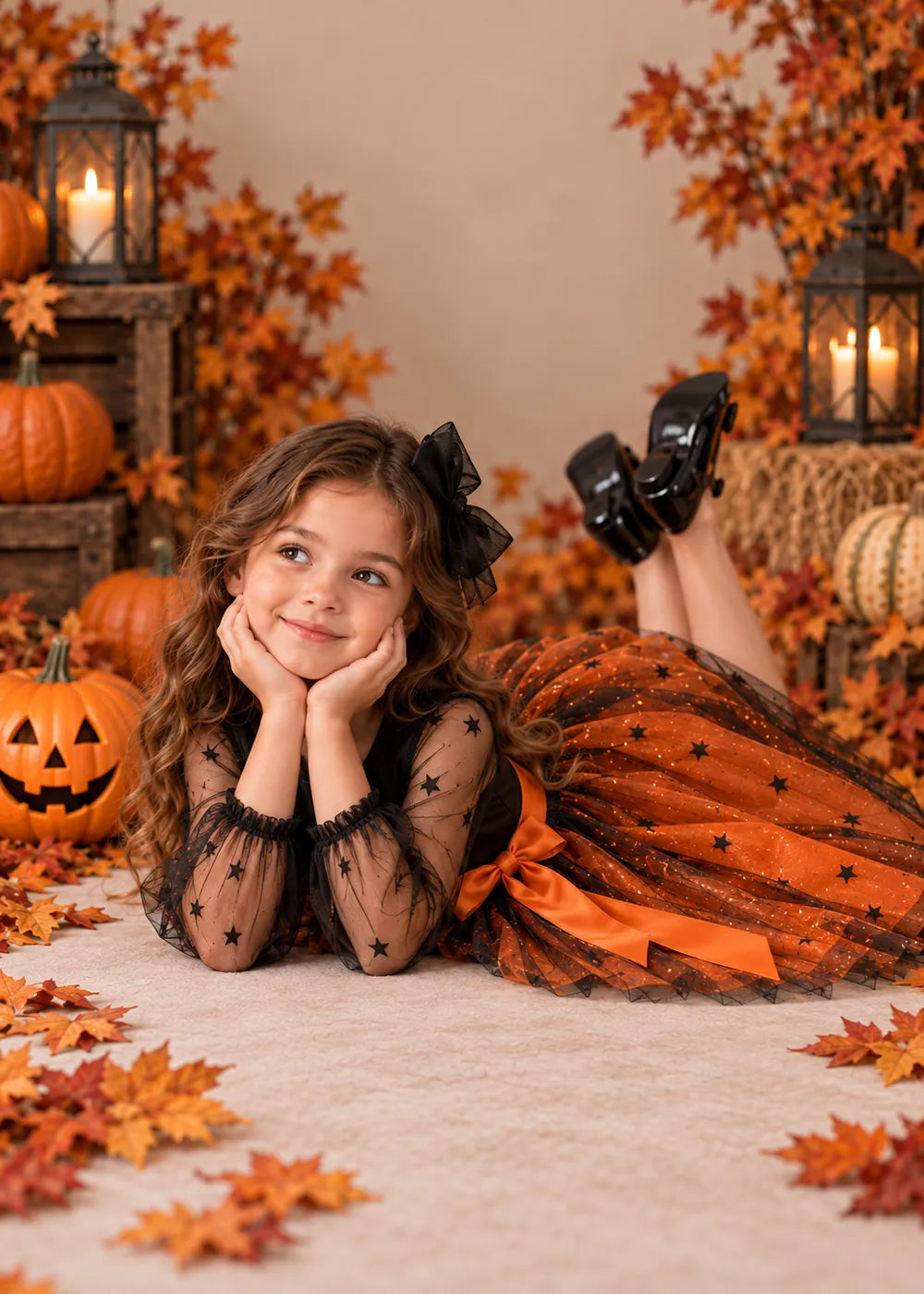 Detail view of the orange and black flower girl dress.