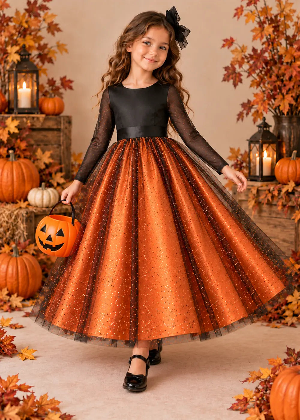 Front view of the orange and black flower girl dress.