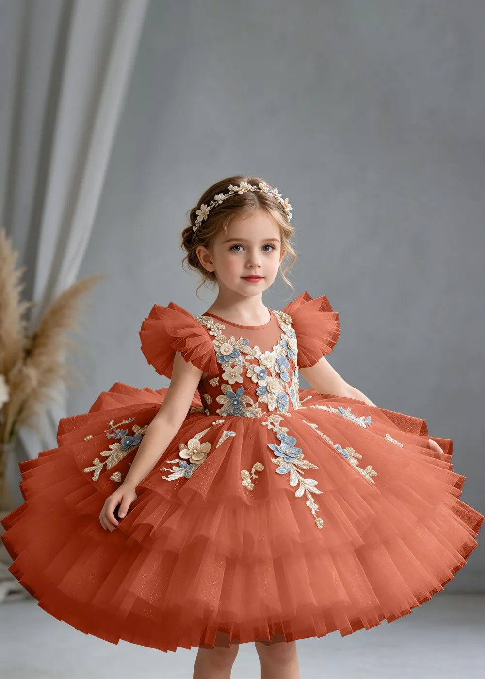 Flower girl dress in Terracotta, front view.