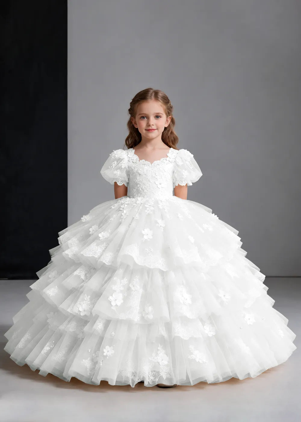 Flower girl dress in White, front view.
