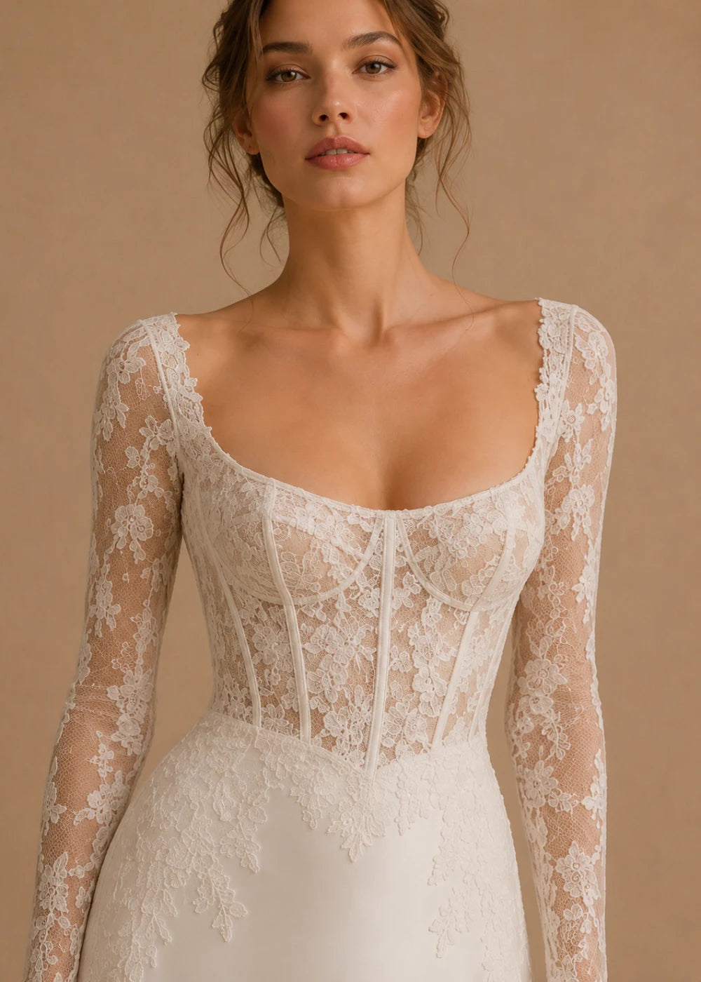 Detail view of the ivory square-neck A-line gown with a lace corset-style bodice, long sleeves, and a train