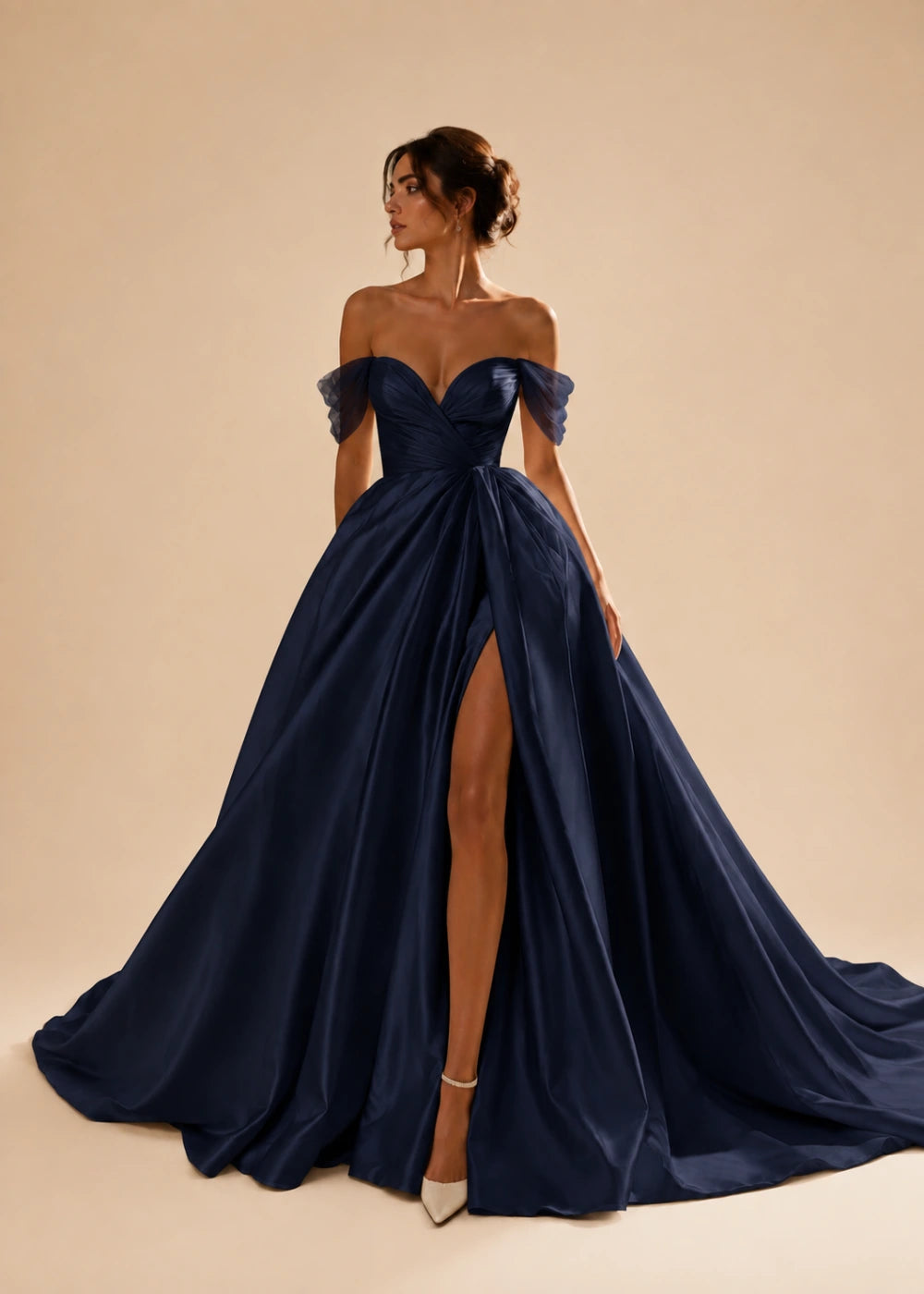 Front view of the navy blue off-the-shoulder A-line gown with a corset bodice, high slit, and train