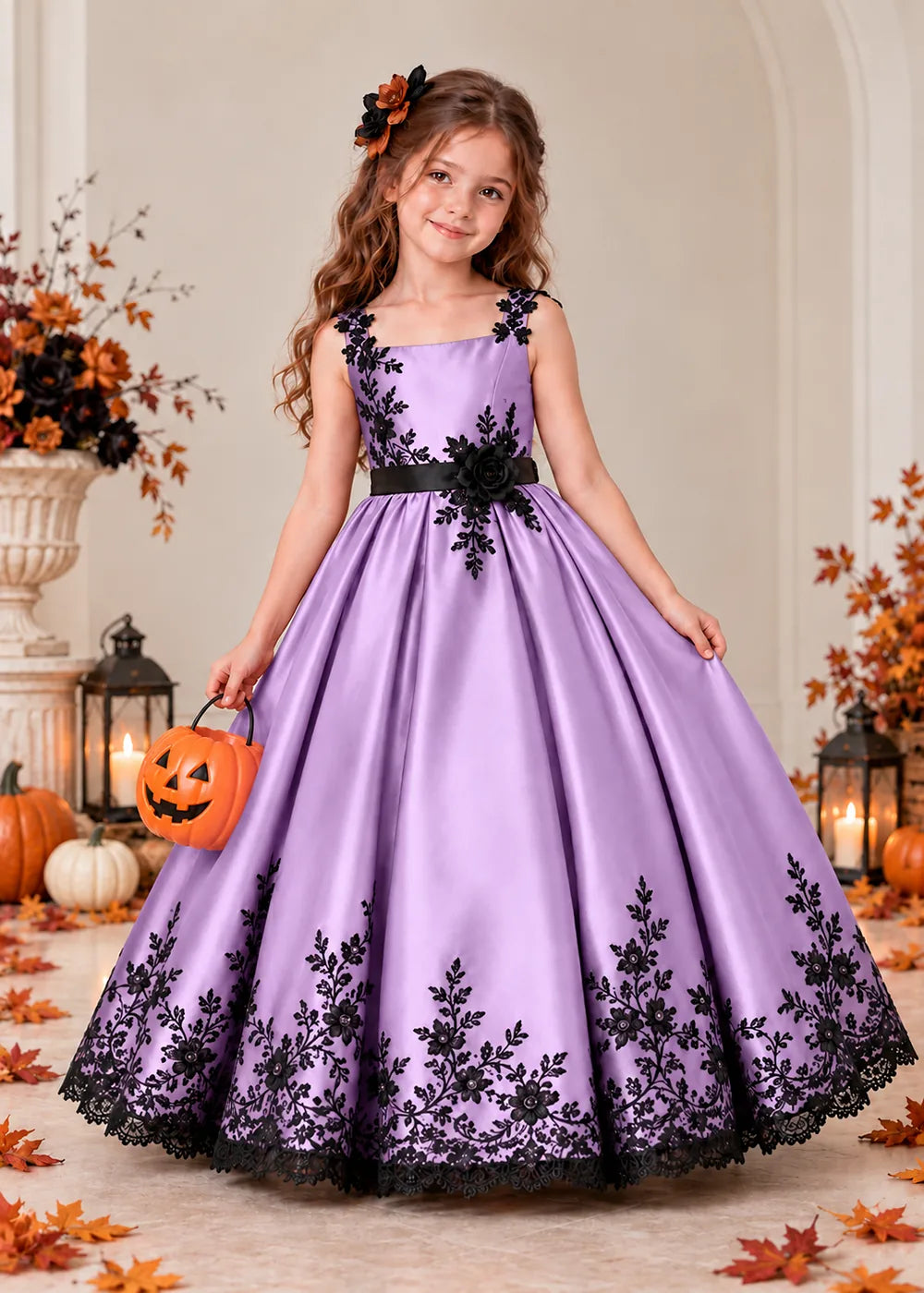 Front view of a lavender flower Girl Dress with Black Floral Straps and Hem.