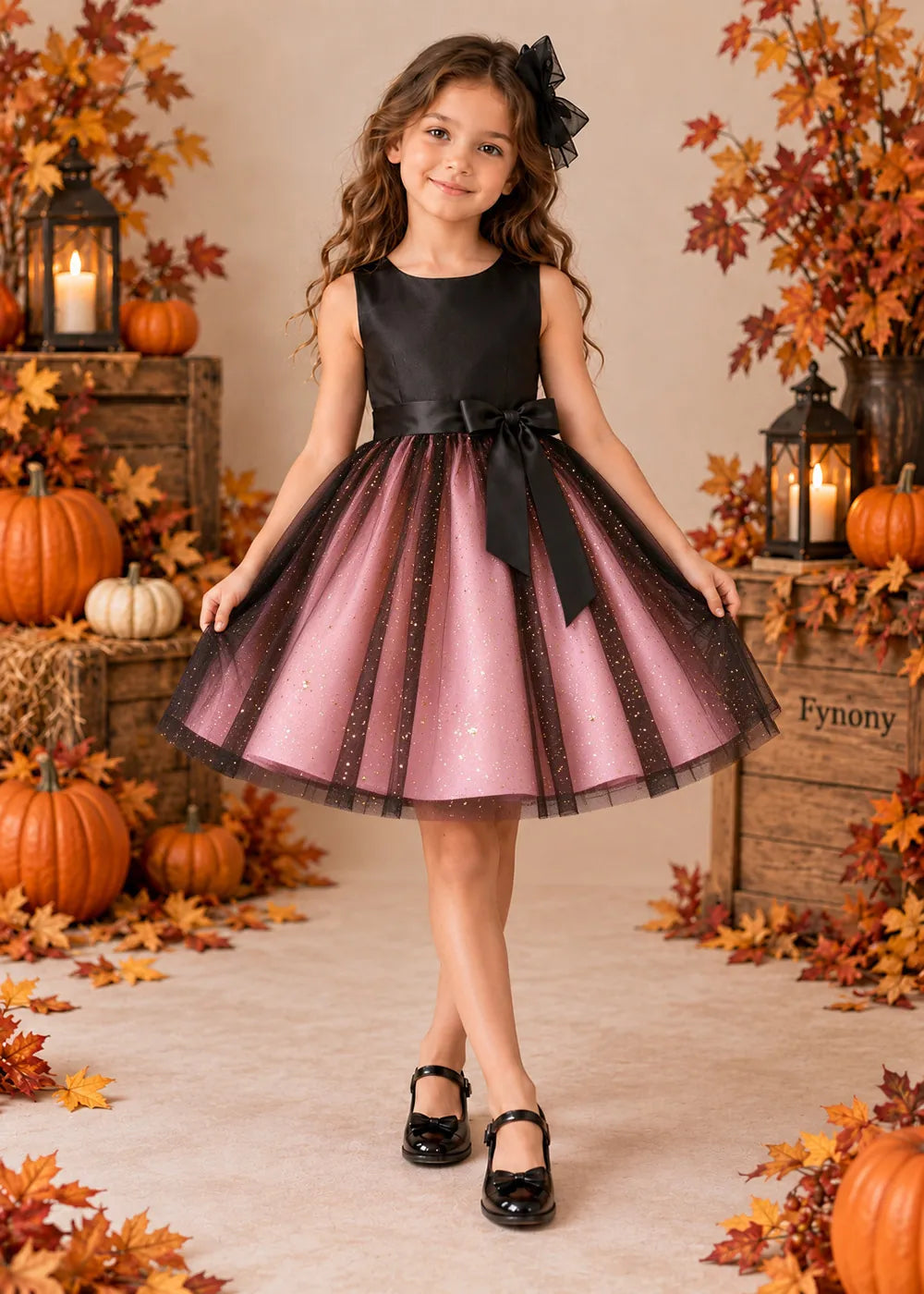 Front view of a blush pink sleeveless Flower Girl Dress with Front Bow.