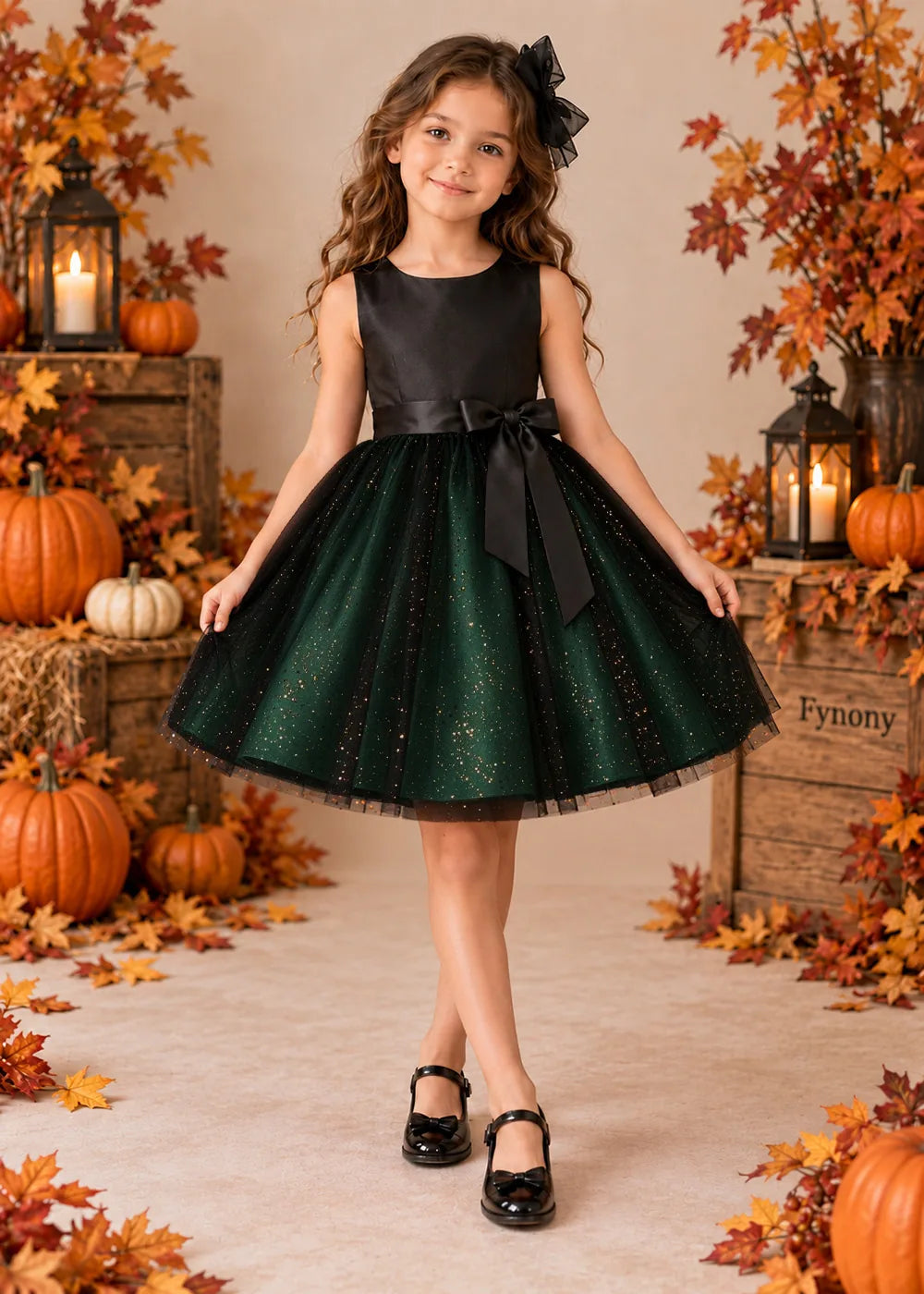 Front view of a emerald green sleeveless Flower Girl Dress with Front Bow.