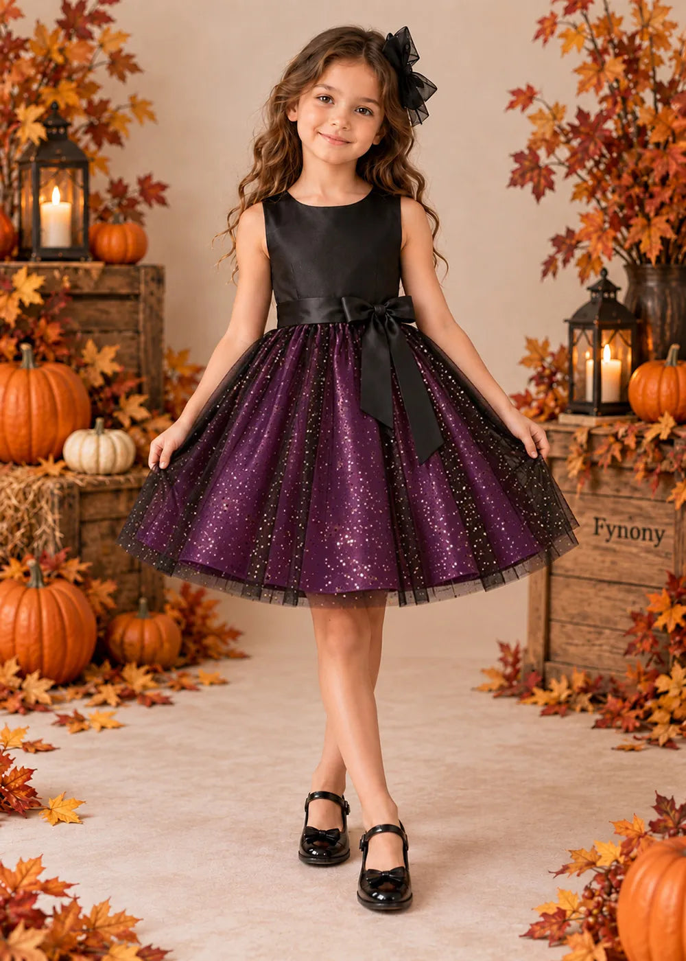 Front view of a purple sleeveless Flower Girl Dress with Front Bow.