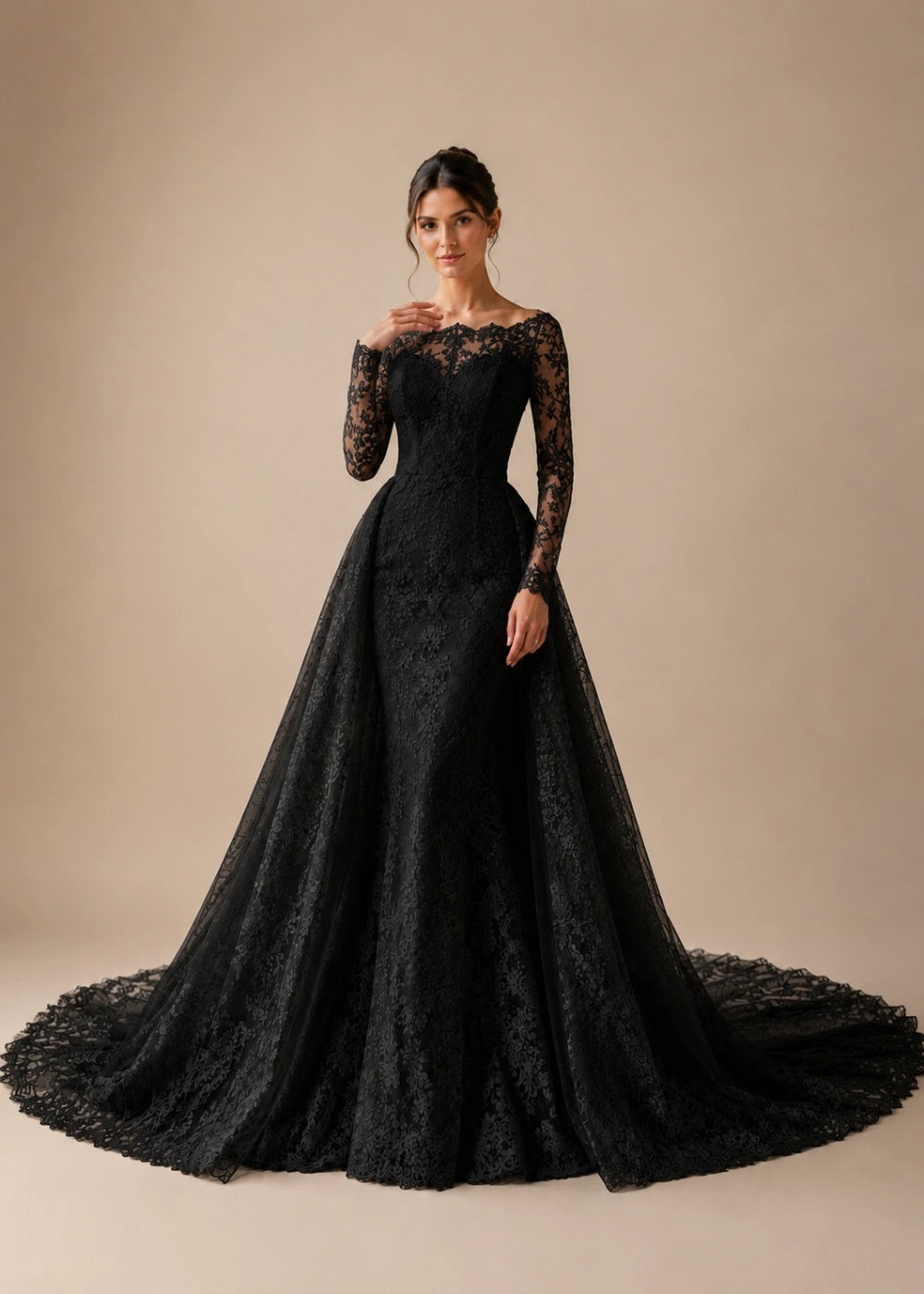 Front view of the black illusion-neck A-line gown with all-over floral lace, long sleeves, and a train
